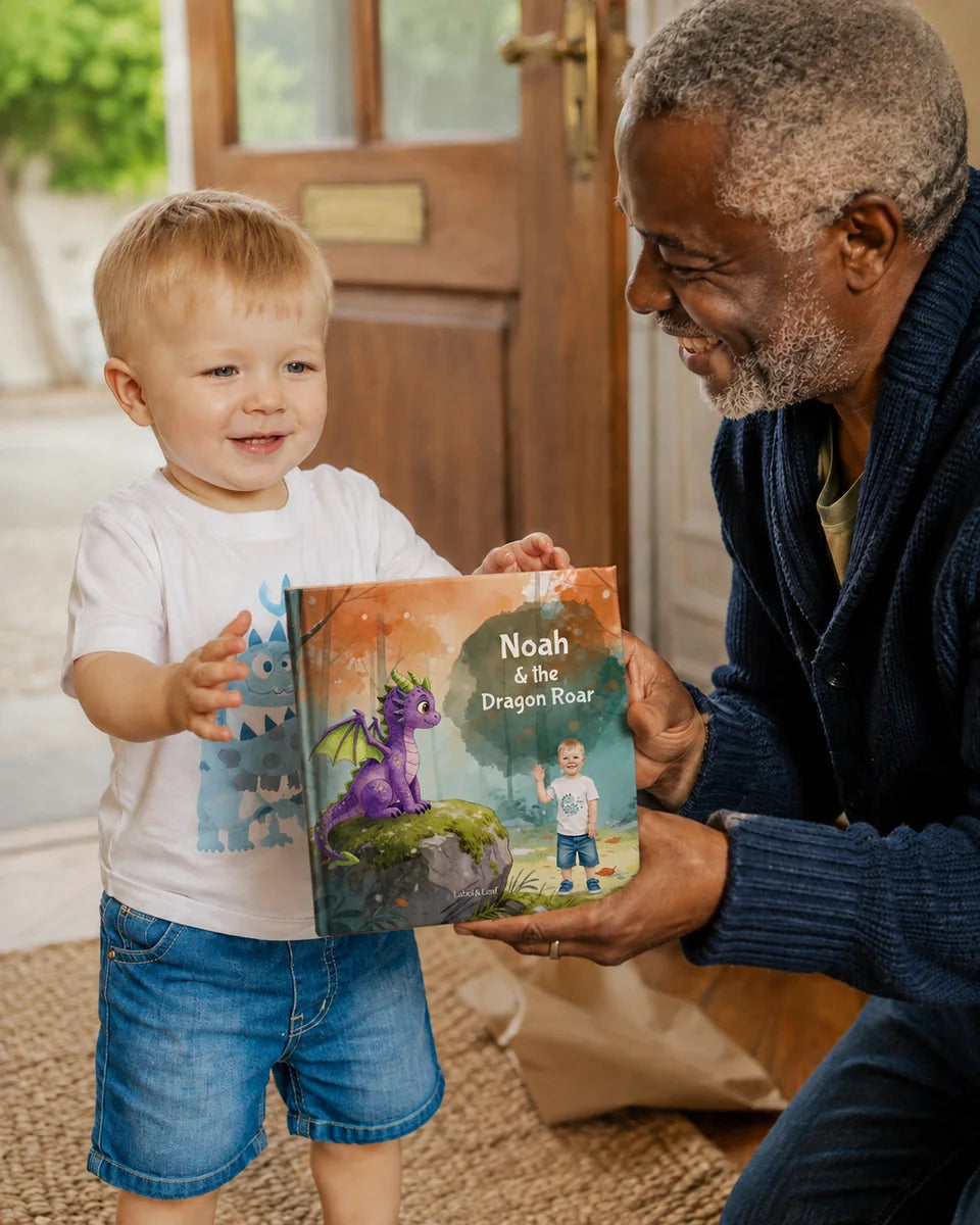A child holding their personalized copy of Dragon Roar